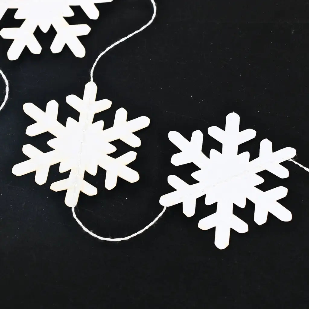 Festive Matte White Snowflake Paper Garland for Winter-Themed Parties