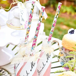 Alice in Wonderland mini “Drink Me” party bottles with straws