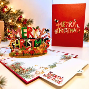Australian wildlife Christmas pop-up card featuring native birds, animals and festive flowers