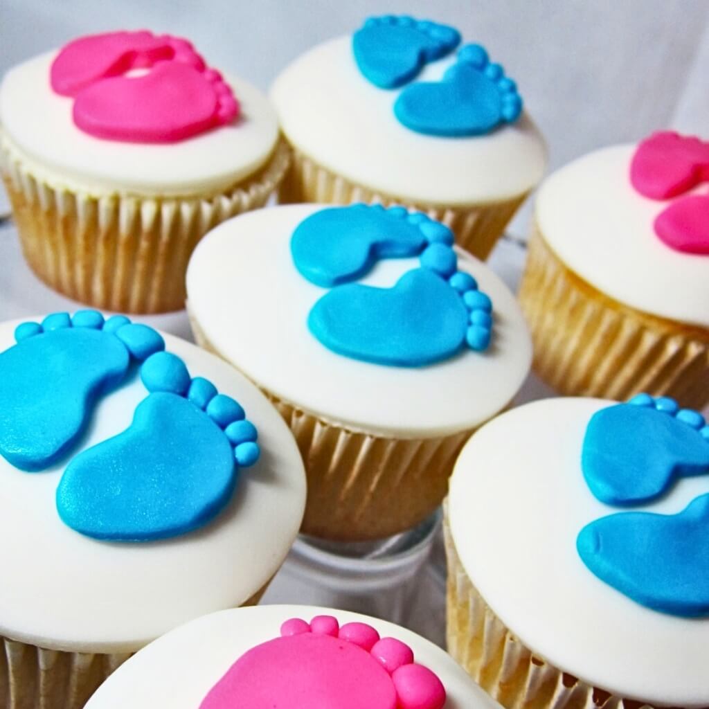 mini baby footprint fondant decorations on cupcakes
