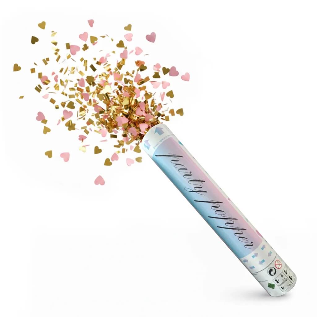Gender reveal popper releasing pink and gold foil hearts