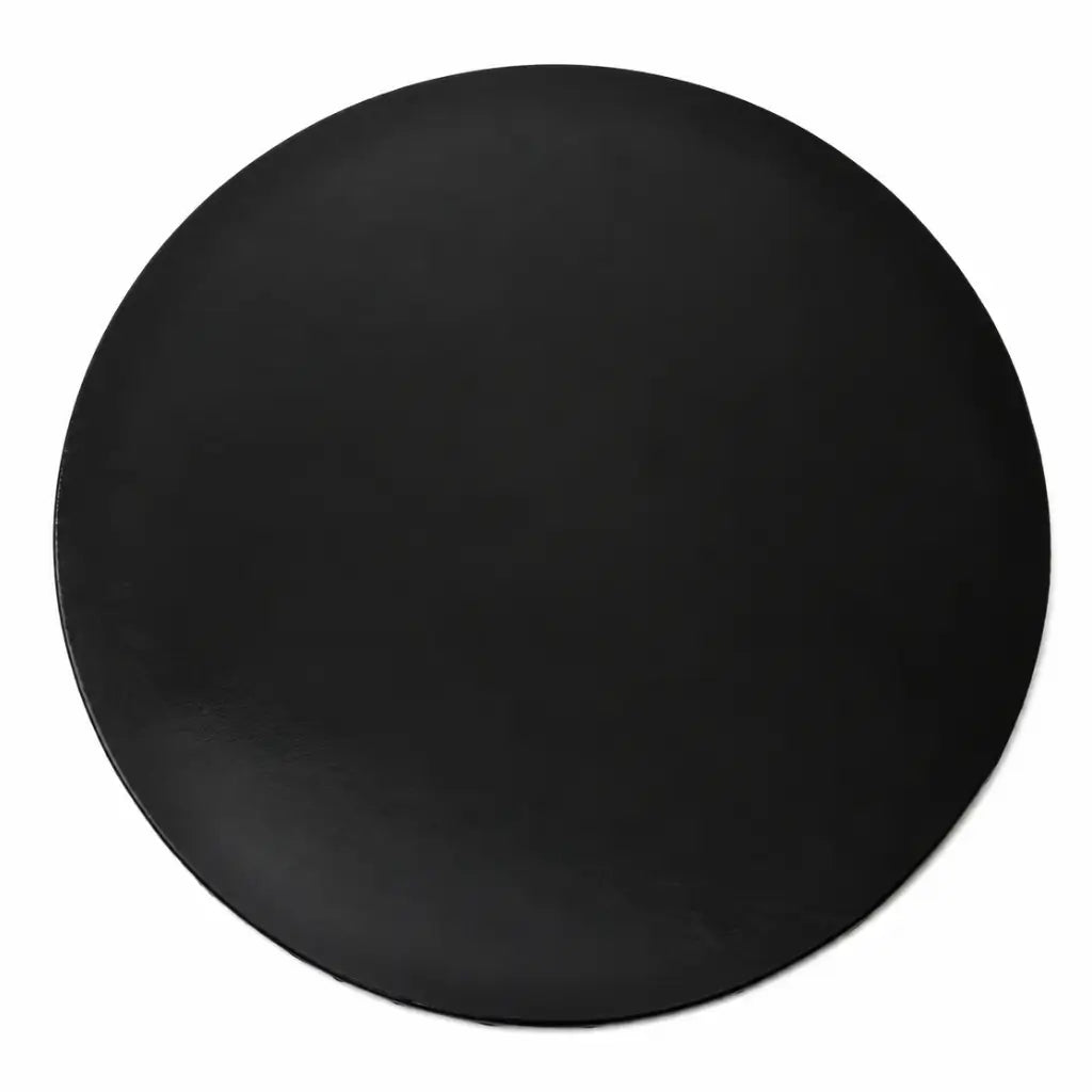 Top view of a plain black 10-inch round masonite cake board with smooth surface