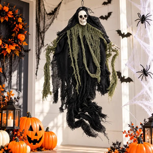 Black skull reaper decoration draped in ragged black and grey fabric