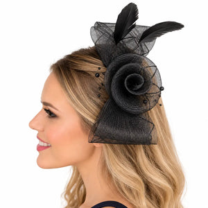 Black mesh flower fascinator decorated with feathers and bead sprays
