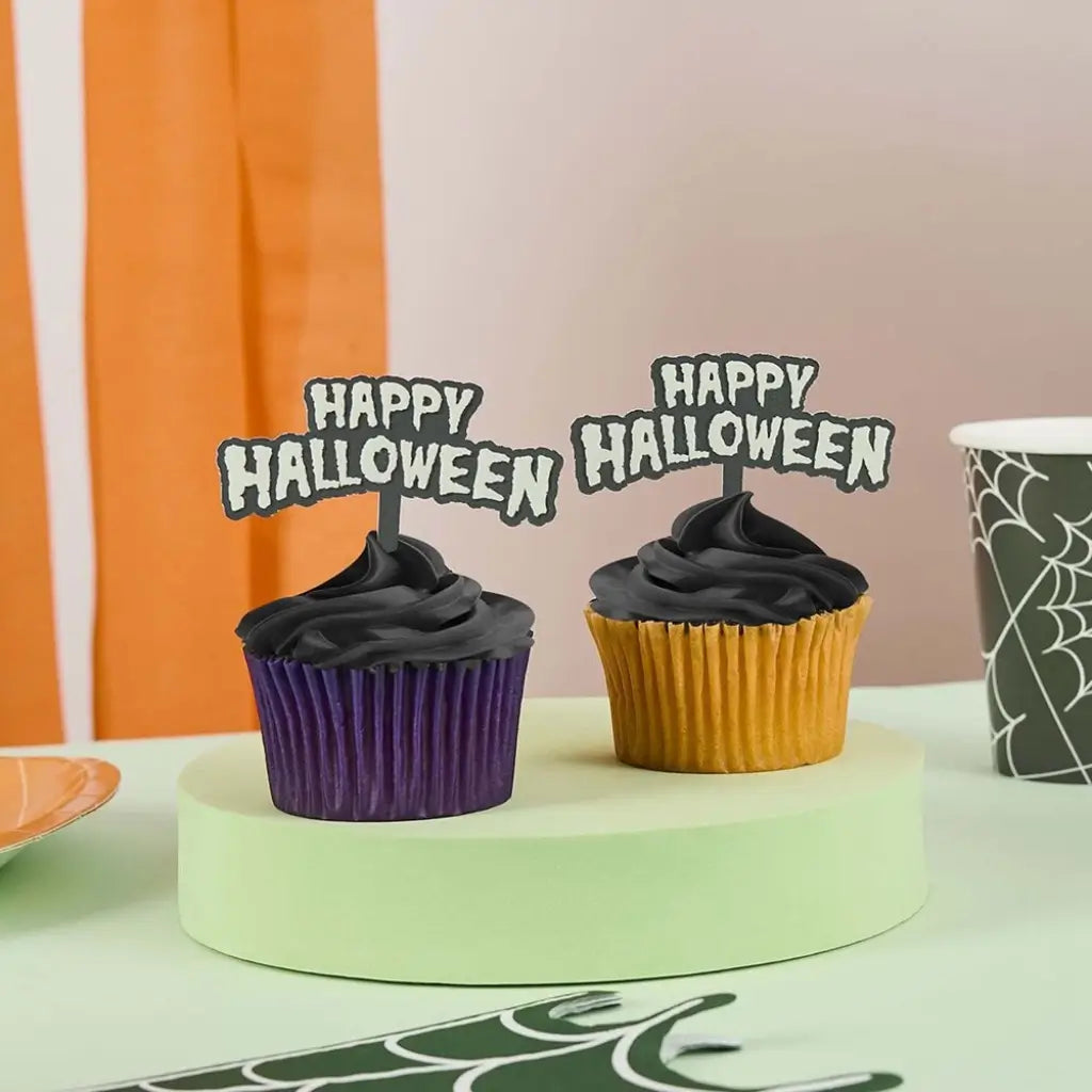 Black and white retro Halloween picks decorating party cupcakes