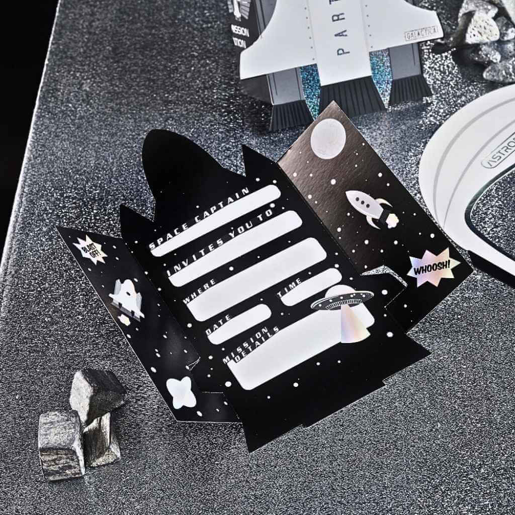 Rocket-shaped tri-fold invitations for kids’ space blast off birthday party