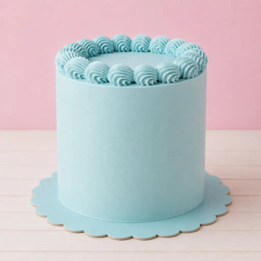 Papyrus pastel blue scalloped cake board measuring 25.4cm