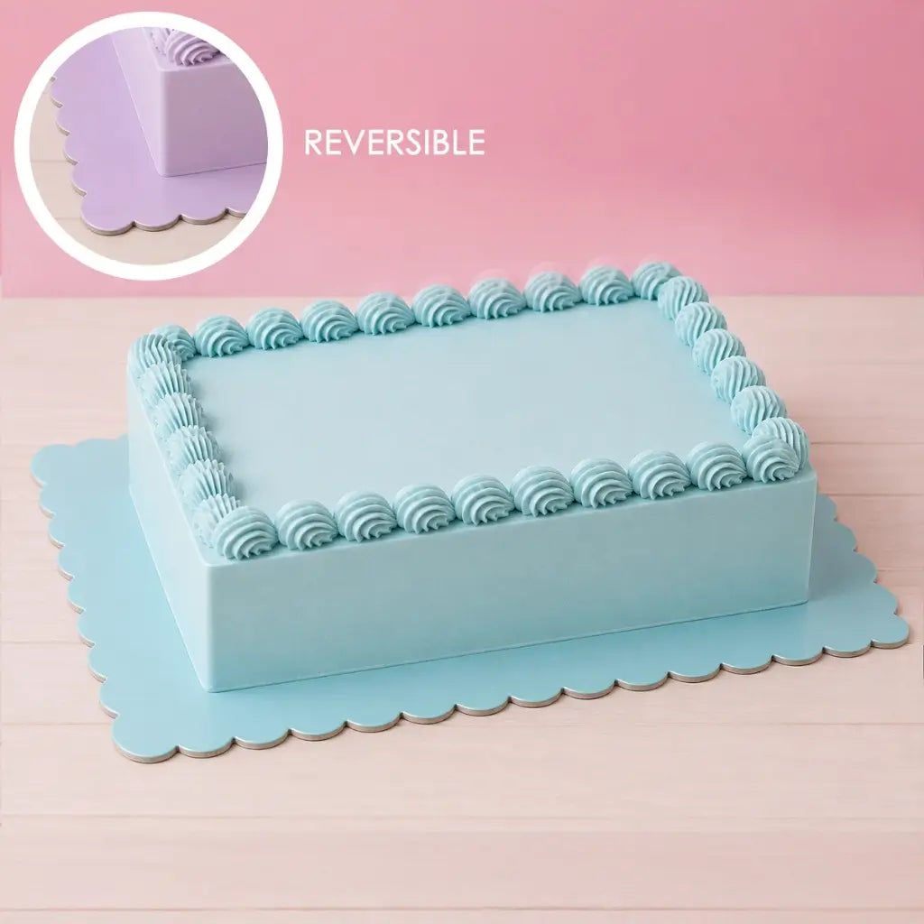 Reversible blue and lilac rectangle cake board with scalloped edges