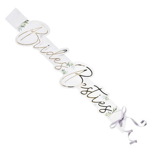 Picture-perfect hen night sashes with soft greenery