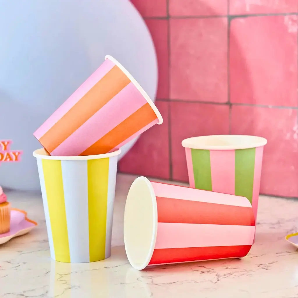 Set of 8 colourful striped 250ml paper cups for carnival and rainbow party themes