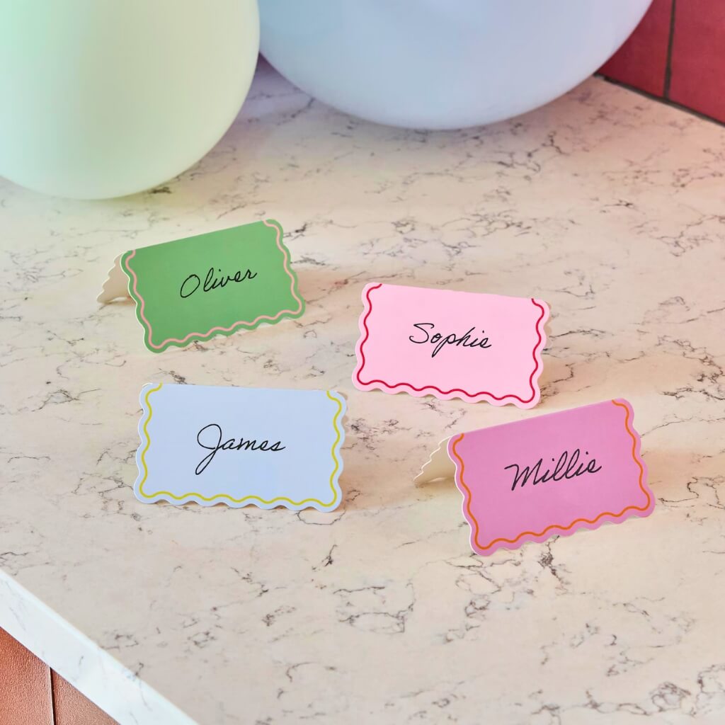 Pack of 8 colourful wavy edge place cards for bright party table setting