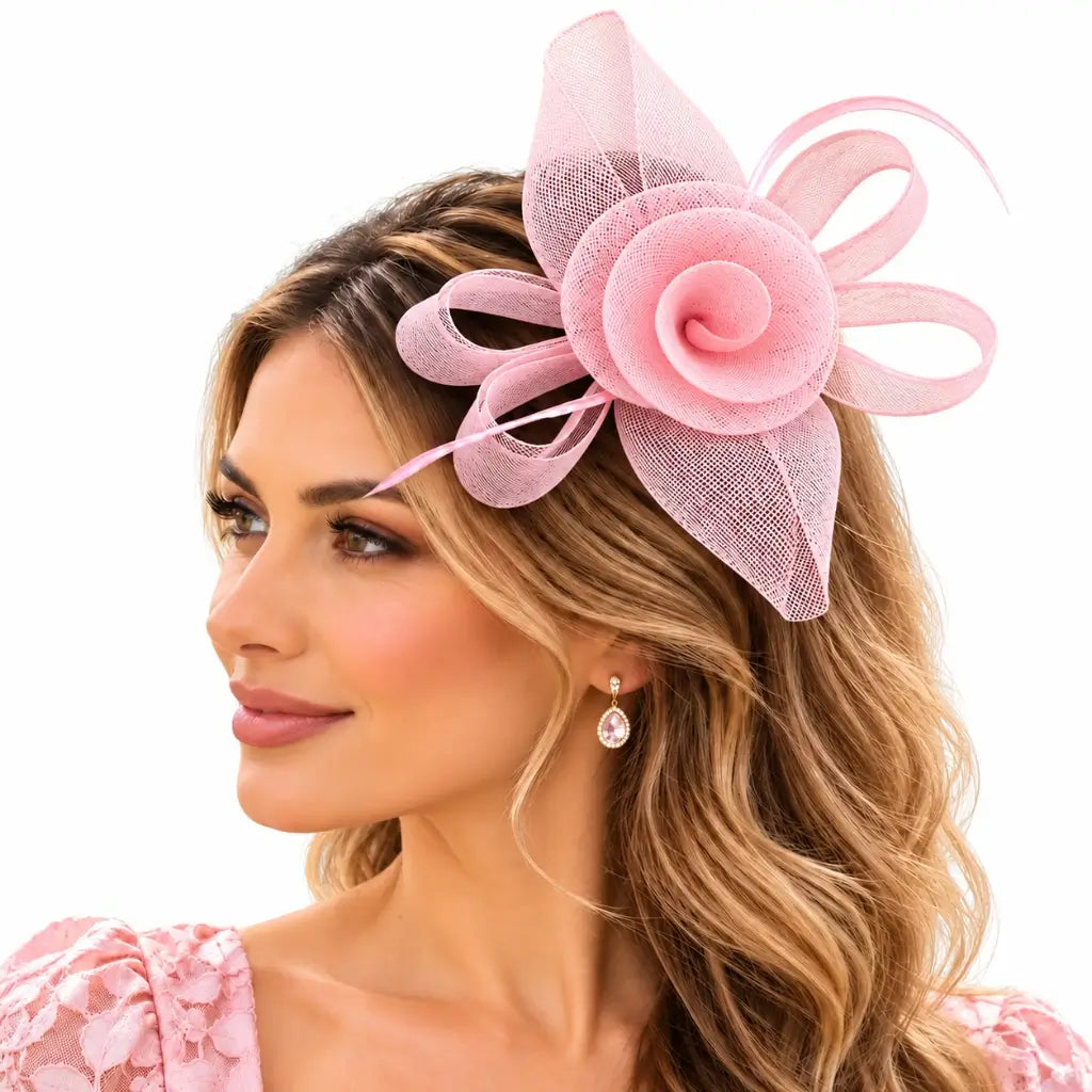 Blush pink flower fascinator with airy loops for race-day styling