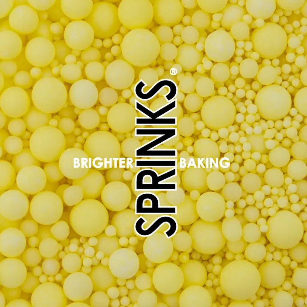 Yellow sugar pearls and nonpareils for cupcakes and cookies