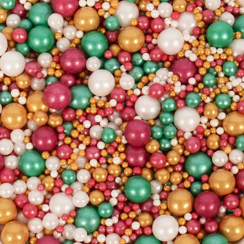 Red, green, gold and pearl Christmas sprinkles in assorted sizes