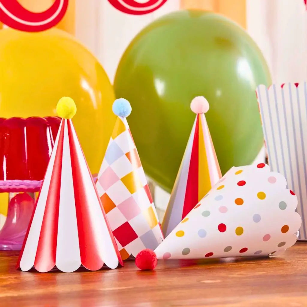 Circus party hats with pom poms colourful design