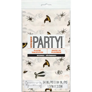 Halloween tablecover printed with spiders skulls and witch-inspired illustrations