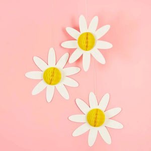 White daisy paper honeycombs with yellow centre for floral party decor