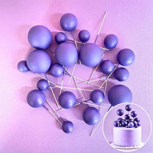 Matte purple foam balls with wire stems for cake decorating