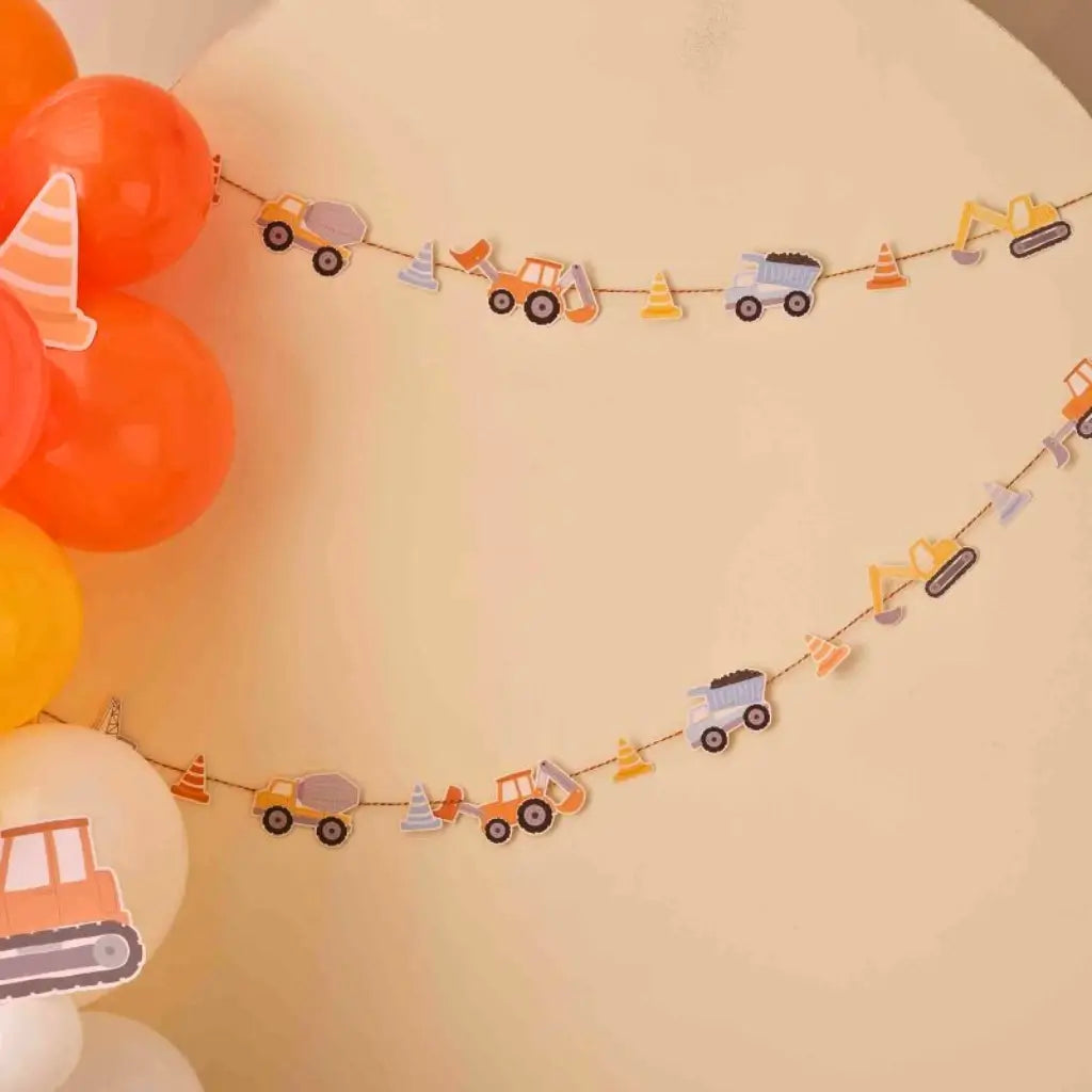 Diggin’ It construction vehicle garland with trucks and cones