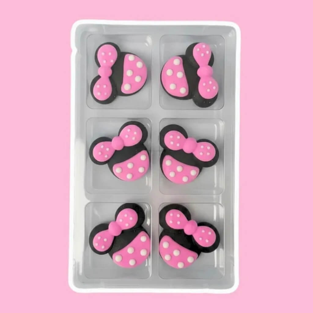 Disney Minnie Mouse Head edible sugar decorations with pink polka dot bows for cakes and cupcakes.