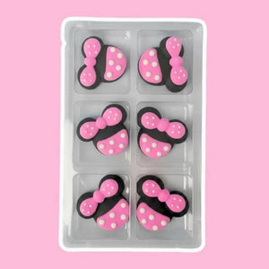 Disney Minnie Mouse Head edible sugar decorations with pink polka dot bows for cakes and cupcakes.