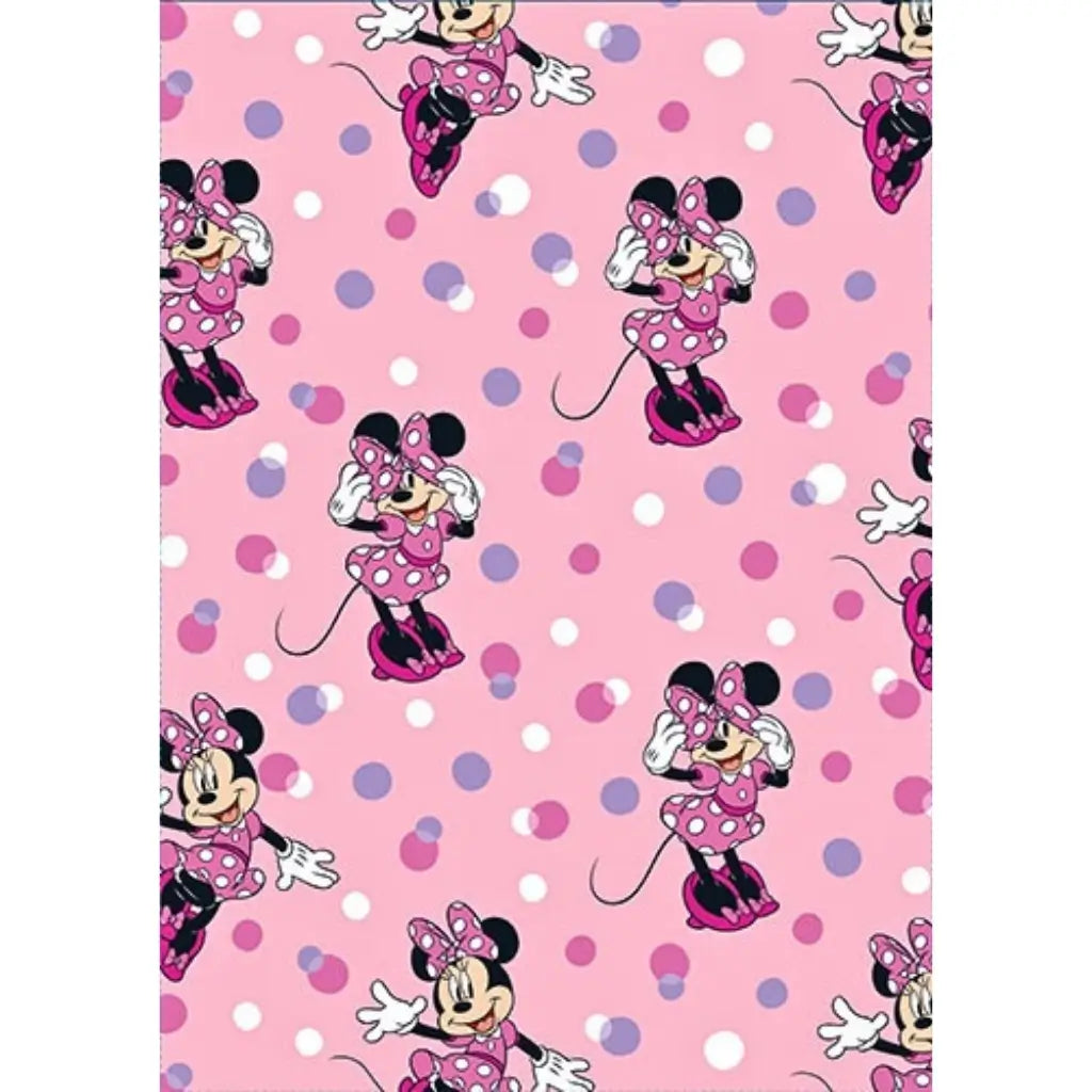 Official Disney Minnie Mouse pink wrapping paper sheet featuring Minnie Mouse with colourful polka dots