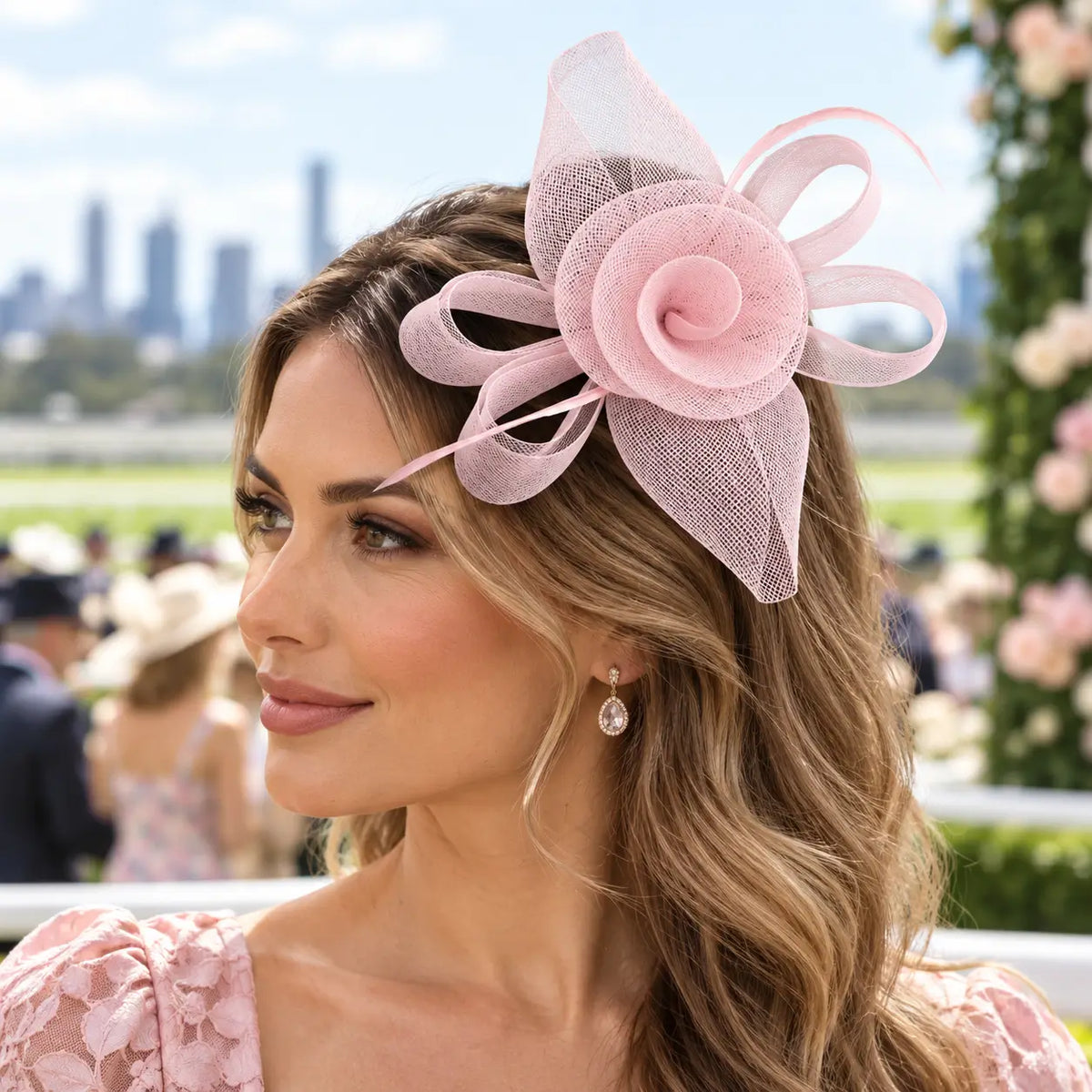 Brooke dusty pink mesh rose fascinator hair clip worn with loose curls