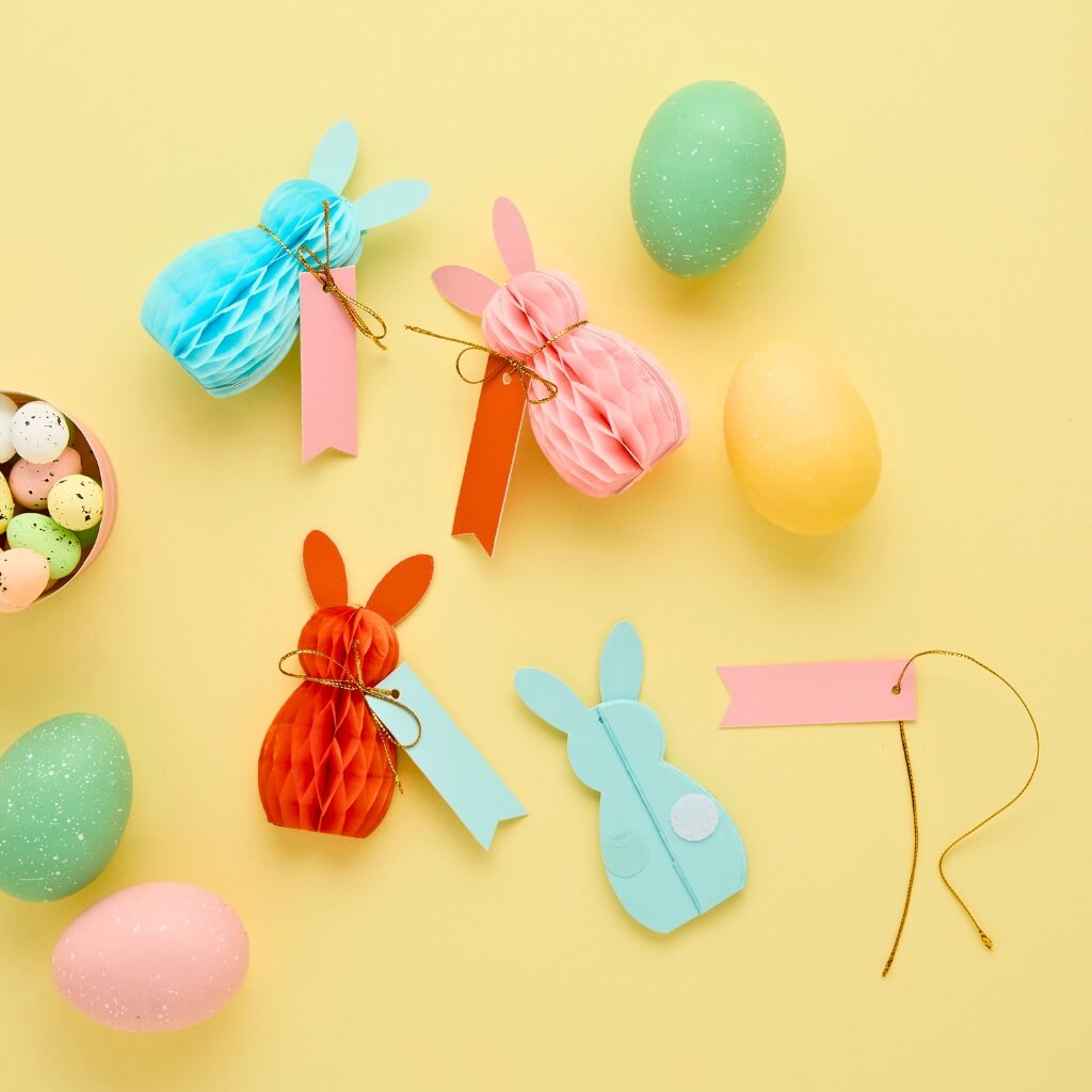 Pink, blue, and orange bunny honeycomb place cards for Easter table