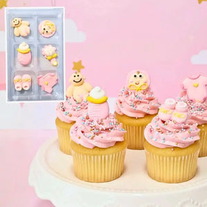 Christening cake decorated with pink sugar toppers