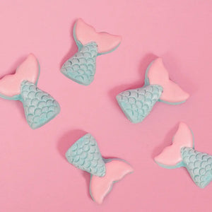 Eight pink and aqua mermaid cupcake toppers with textured scales