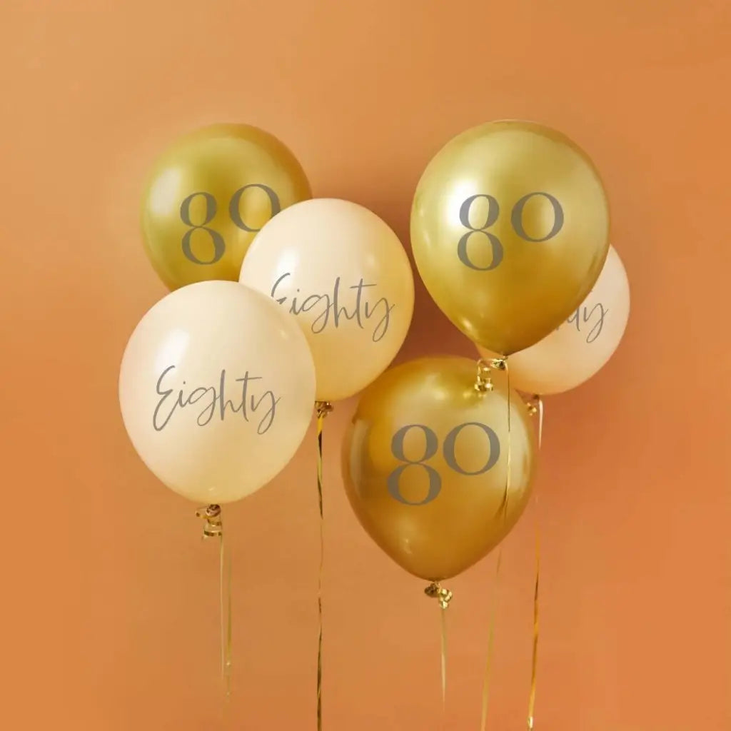 Gold and ivory 80th birthday latex balloons measuring 30cm