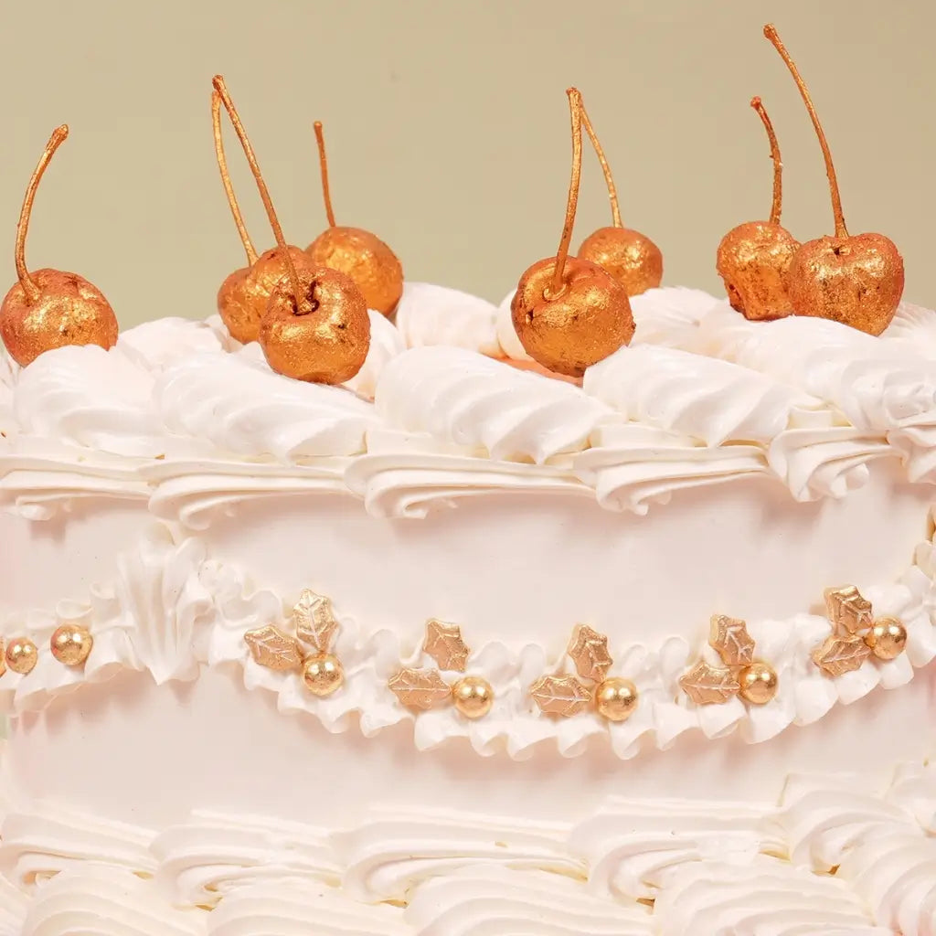 Gold sprinkle bauble for elegant festive cakes and Christmas desserts