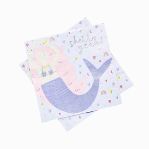 Ocean themed mermaid kids party table setup with mermaid napkins