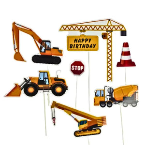 Kids birthday cake decorated with construction vehicles toppers