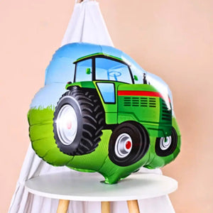 Green tractor shaped balloon for farmyard birthday party