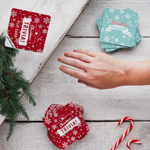 Festive holiday trivia and challenge card game with red and blue snowflake design