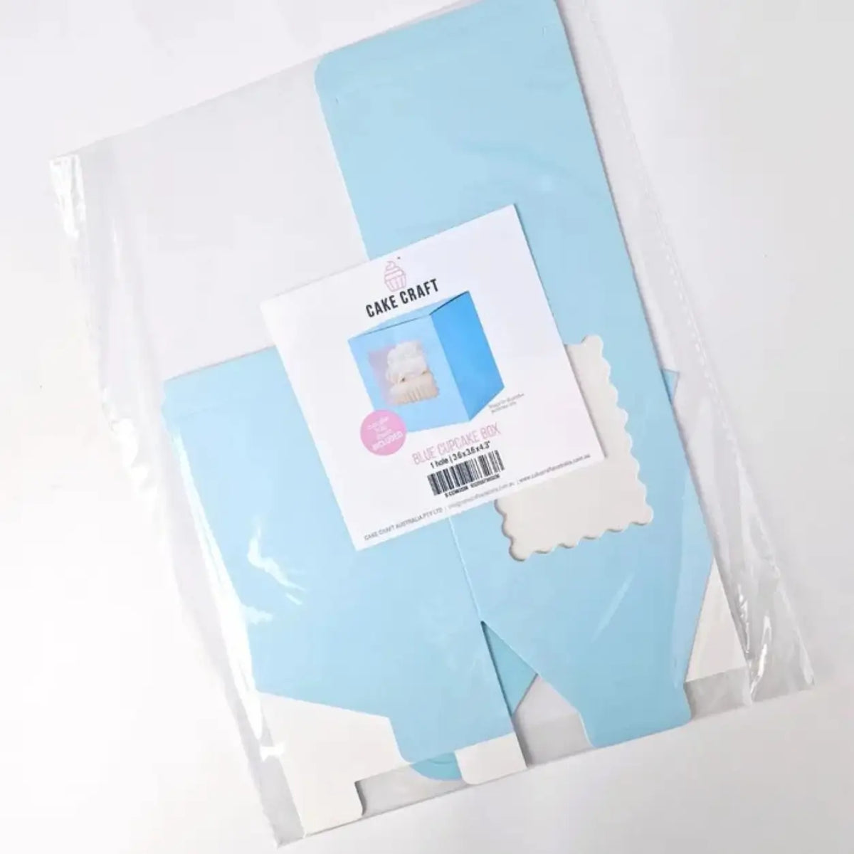 Flat-packed blue cupcake packaging ready for assembly