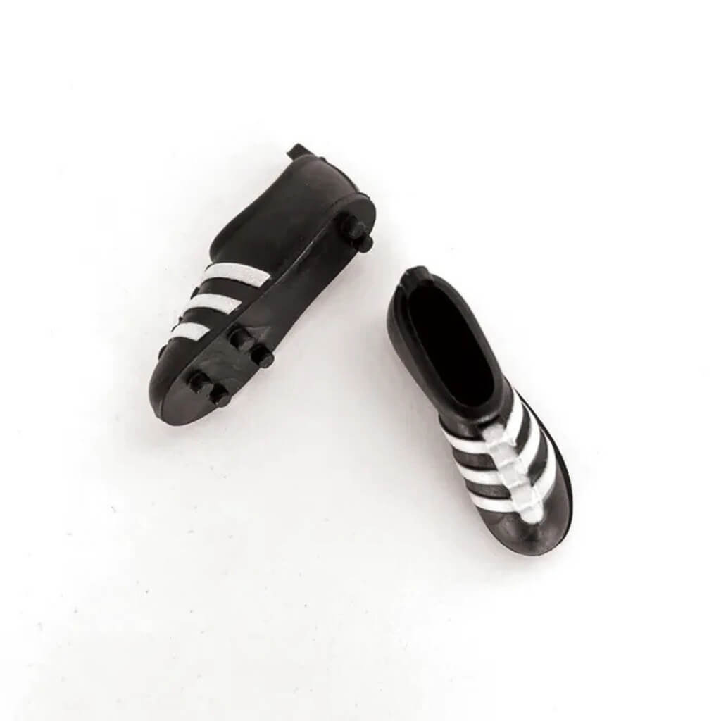 Black and white plastic soccer boot cake decorations