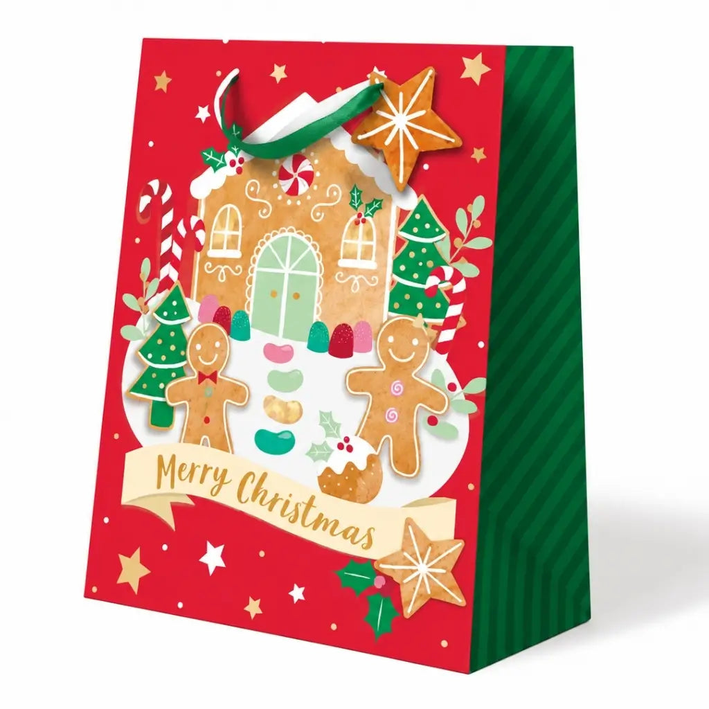 Red Christmas present bag featuring a colourful gingerbread house