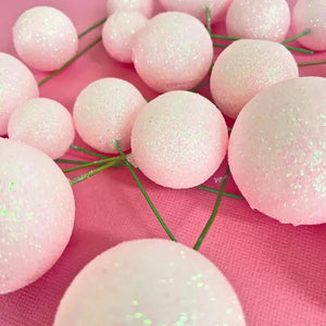 Pink glitter foam balls for cake decorating