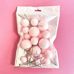 Mixed size baby pink cake decoration spheres