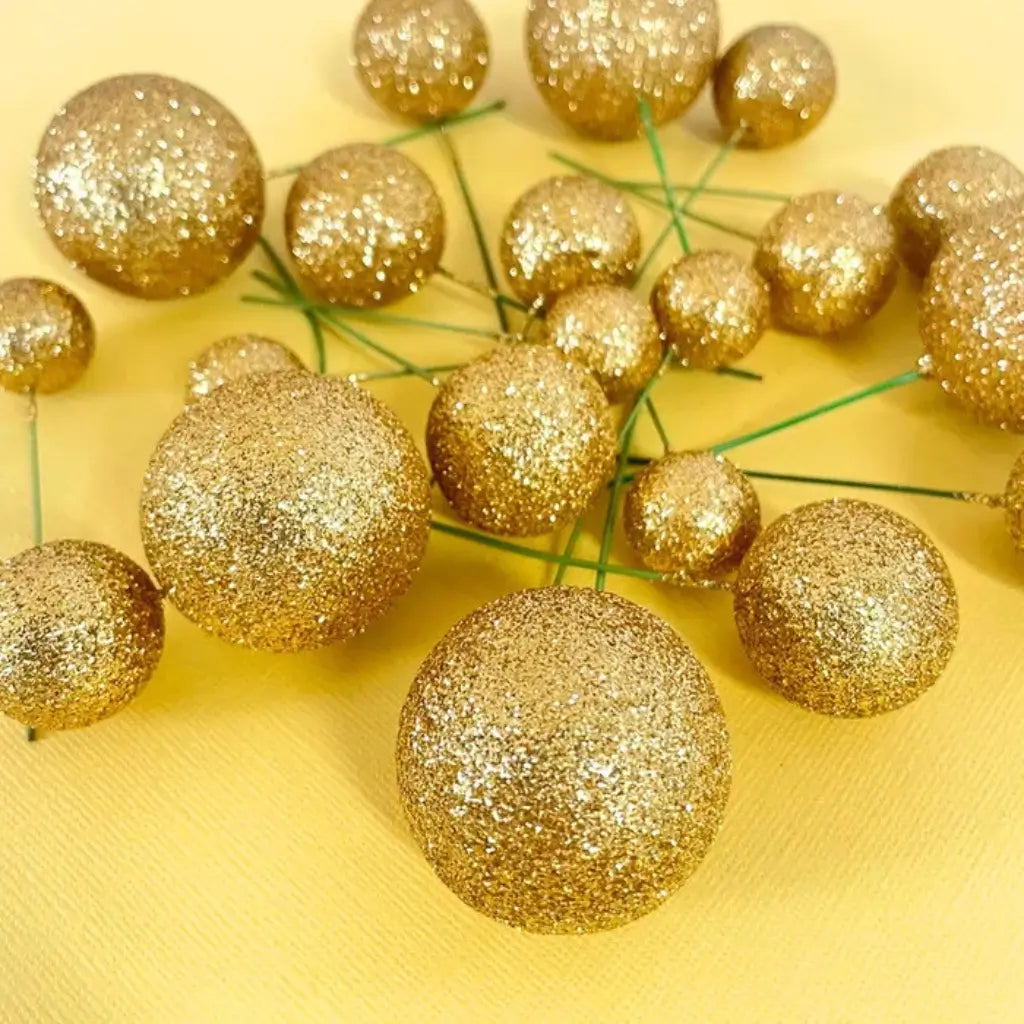 Decorative gold foam balls for birthday and wedding cakes