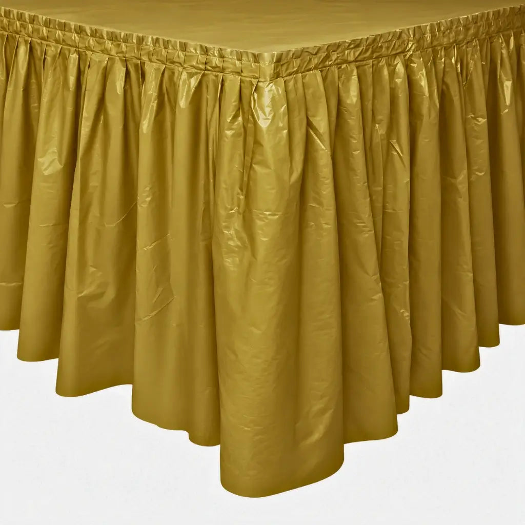Gold plastic party table skirt with gathered pleats measuring 73cm high and 4.3m long