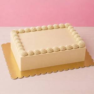 gold rectangle cake board with scalloped edges