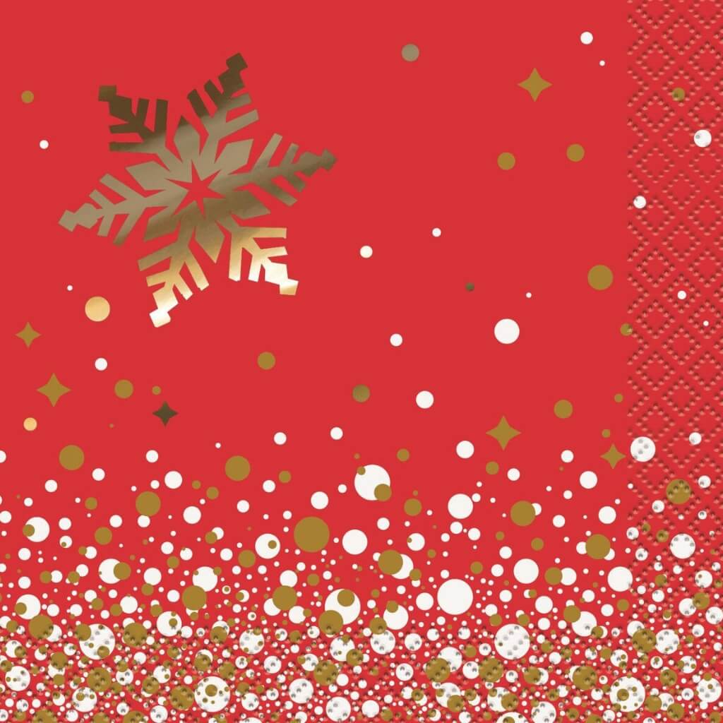 Red napkin with gold and white snowflake and dot pattern