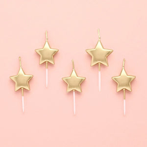 Star shaped gold candles party toppers
