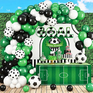 Green and black soccer balloon backdrop