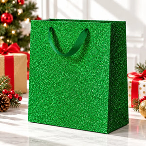 Green Christmas glitter gift bag with matching ribbon handles