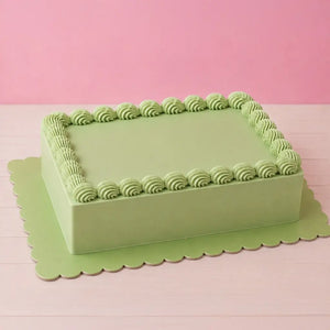 Pastel green rectangle scalloped board for number and slab cakes