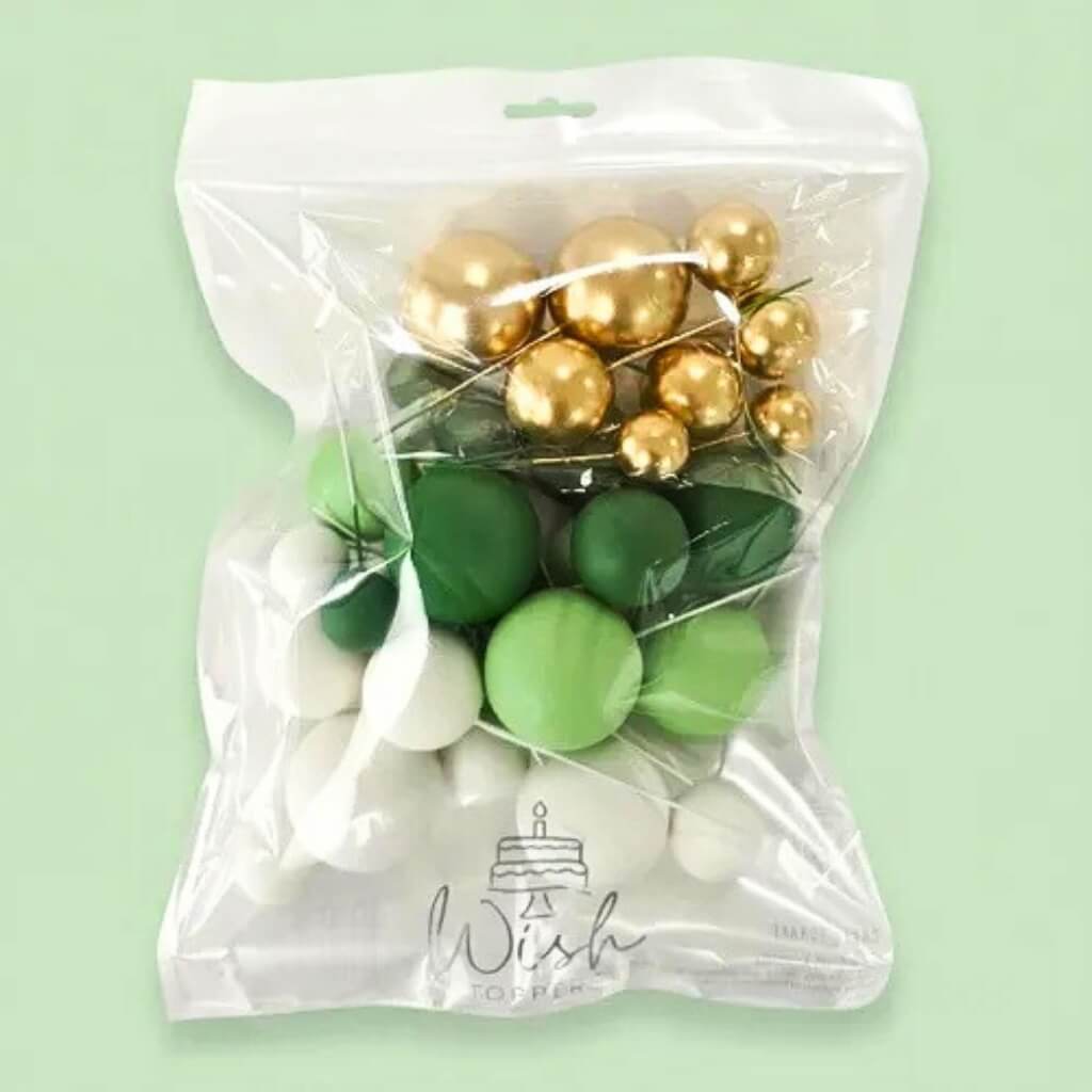 Modern cake decoration spheres in green gold and white
